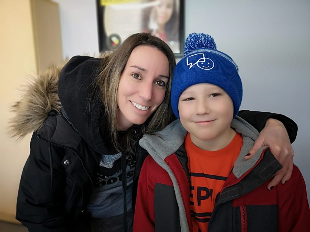 Student and Teacher smile