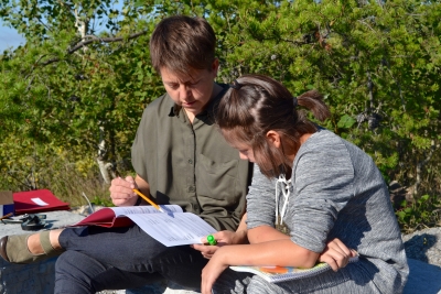 St. David Catholic School Takes Advantage of the Warm Weather and Brings Reading Instruction Outdoors